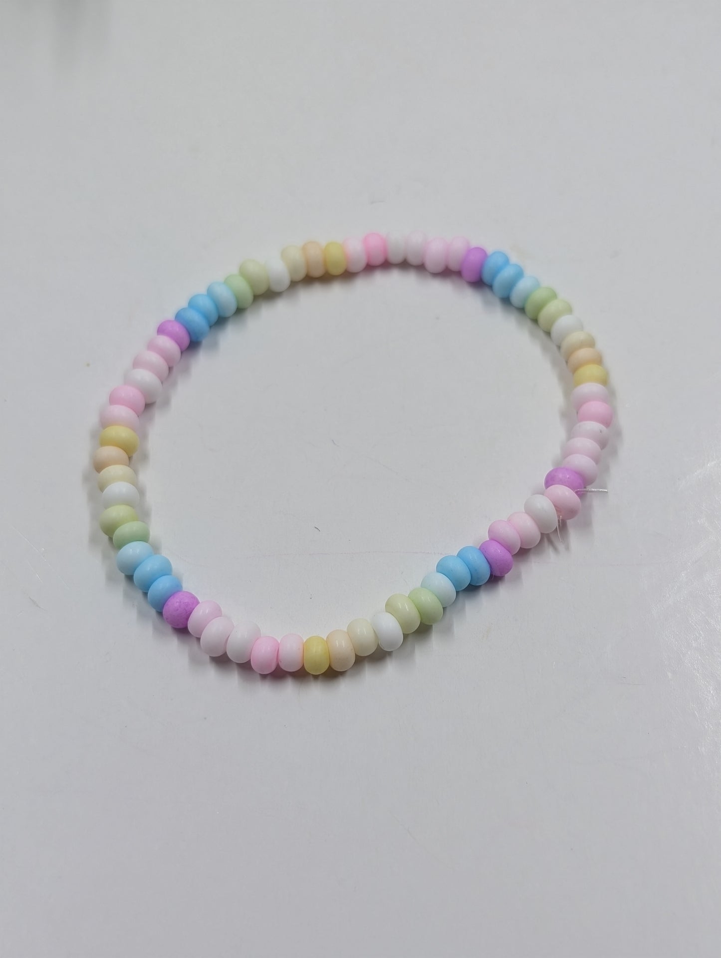 *Candy Necklace Crumbs